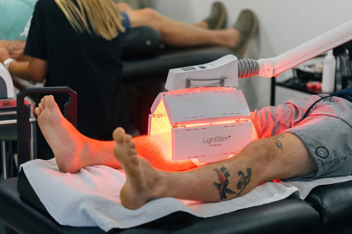 Red light therapy on a patient's leg
