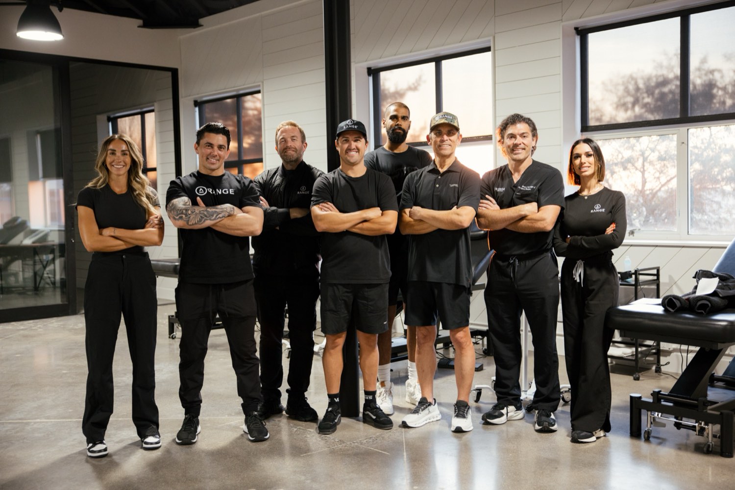 The Range team standing together in the San Clemente treatment space